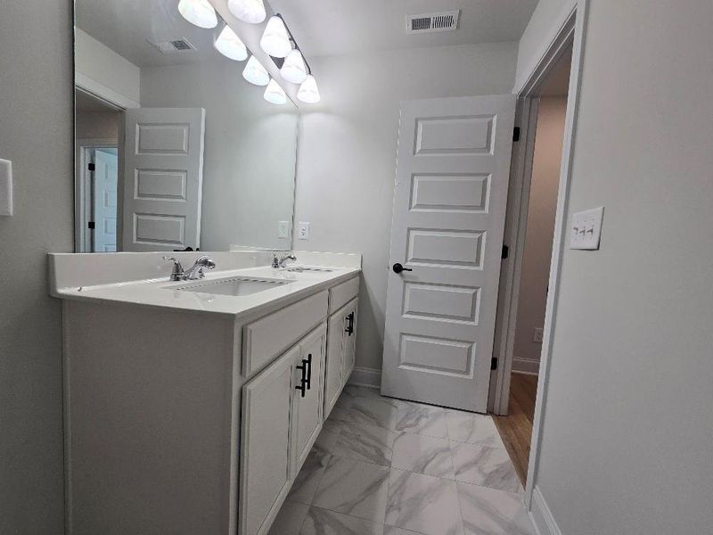 Furnished interior view inside a new home in Waters Edge, Mansfield (Image 12).