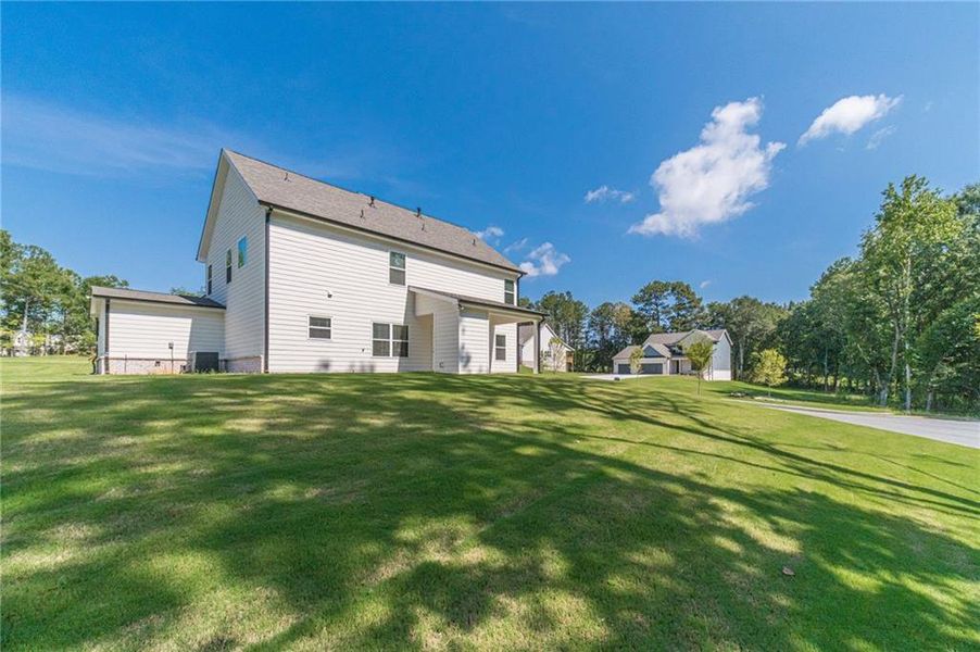 Exterior details and patio area of a home in , Loganville (Image 3).