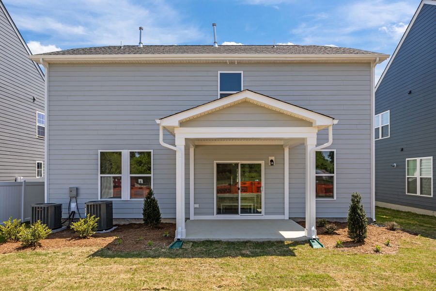 Exterior details and patio area of a home in Neill's Pointe, Angier (Image 3).