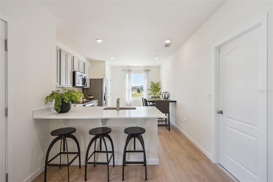 Furnished interior view inside a new home in Oak Pointe, Apopka (Image 13).