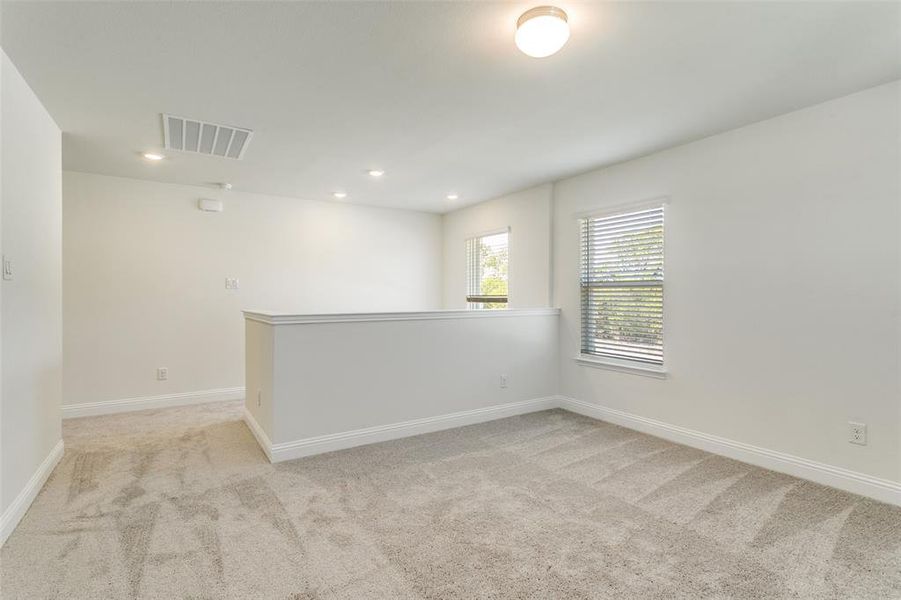 Spacious, unfurnished interior of a new home in The Preserve, Justin (Image 34).