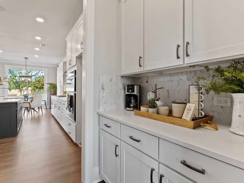 Representative furnished interior of a home built from the Riley P by True Homes in Homecoming, Ravenel (Image 8).