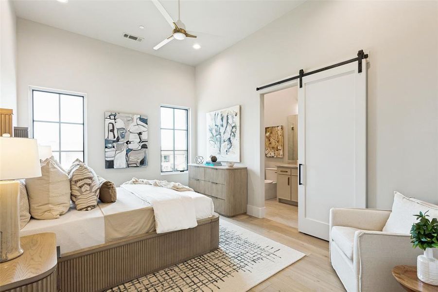 Guest suite is spacious with an en suite bath with large walk in closet.