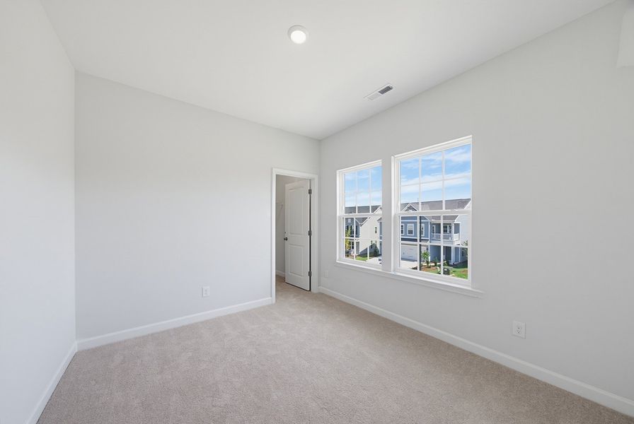 Spacious, unfurnished interior of a new home in Sweetbrier, Durham (Image 31).