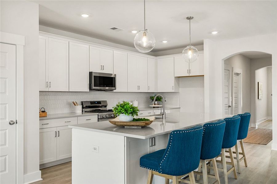 A well-appointed kitchen features stainless steel A well-appointed kitchen features stainless steel