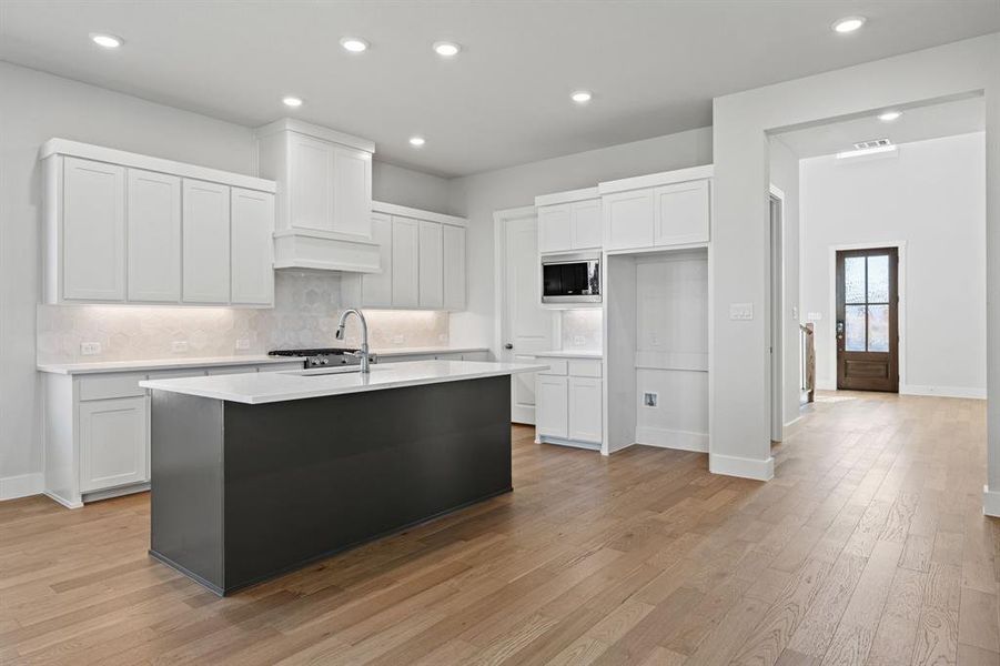 Furnished interior view inside a new home in The Heights at Uptown Celina, Celina (Image 5). Furnished interior view inside a new home in The Heights at Uptown Celina, Celina (Image 5).