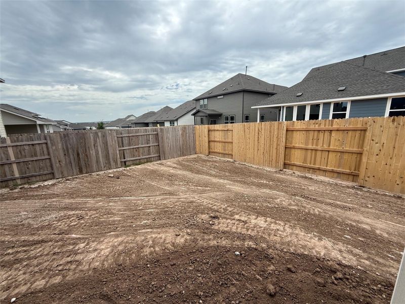 Front exterior of a new home in Cannon Ranch 40s, Dripping Springs, TX, highlighting curb appeal (Image 17). Front exterior of a new home in Cannon Ranch 40s, Dripping Springs, TX, highlighting curb appeal (Image 17).