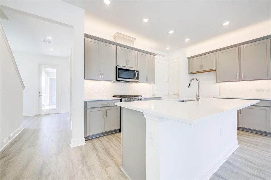 Furnished interior view inside a new home in Bungalow Walk at Lakewood Ranch, Sarasota (Image 7).