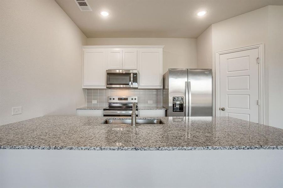 Furnished interior view inside a new home in , Mansfield (Image 5).