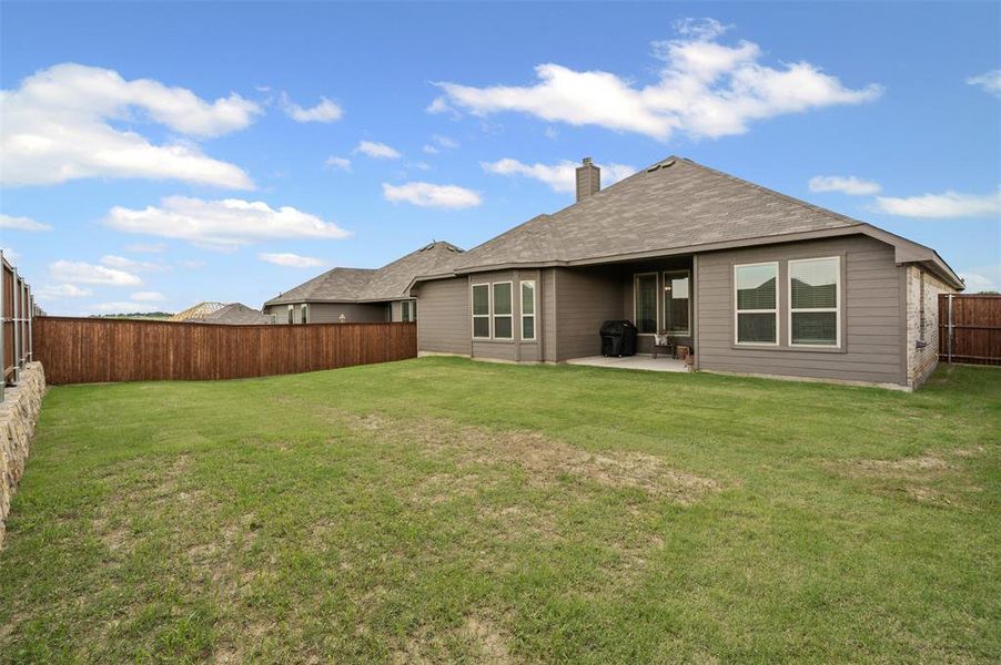 Exterior details and patio area of a home in , Godley (Image 27).