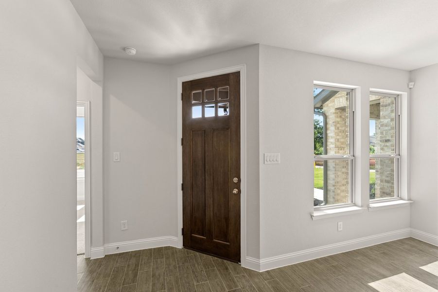 Front exterior of a new home in Timber Ridge, Corinth, TX, highlighting curb appeal (Image 15). Front exterior of a new home in Timber Ridge, Corinth, TX, highlighting curb appeal (Image 15).