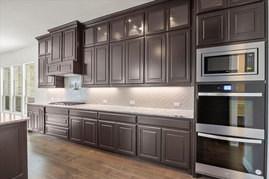 Representative furnished interior of a home built from the Riverdale by Windsor Homes in Ridge Pointe Estates, McLendon-Chisholm (Image 9).