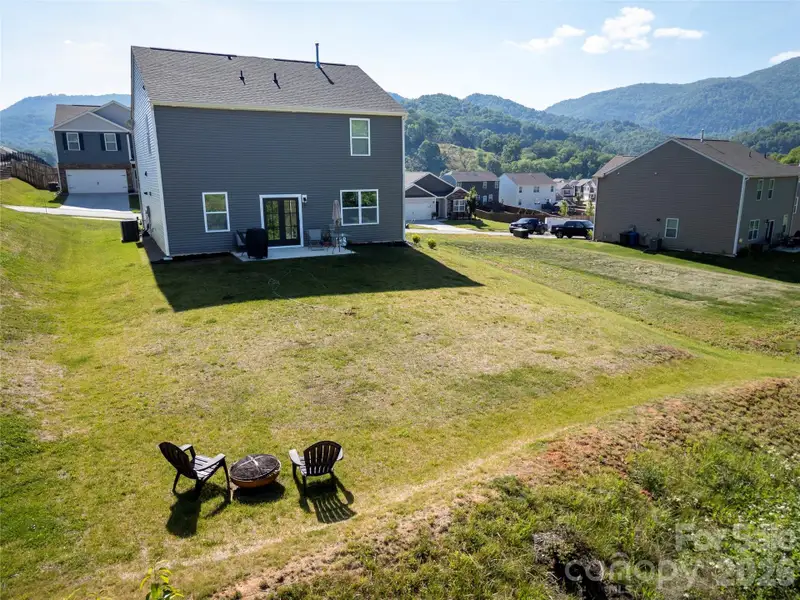 Exterior details and patio area of a home in Valleywood Farms, Waynesville (Image 3).