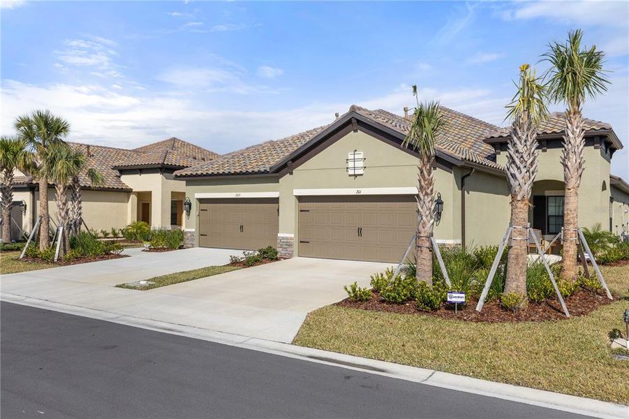 Front exterior of a new home in , Nokomis, FL, highlighting curb appeal (Image 22).
