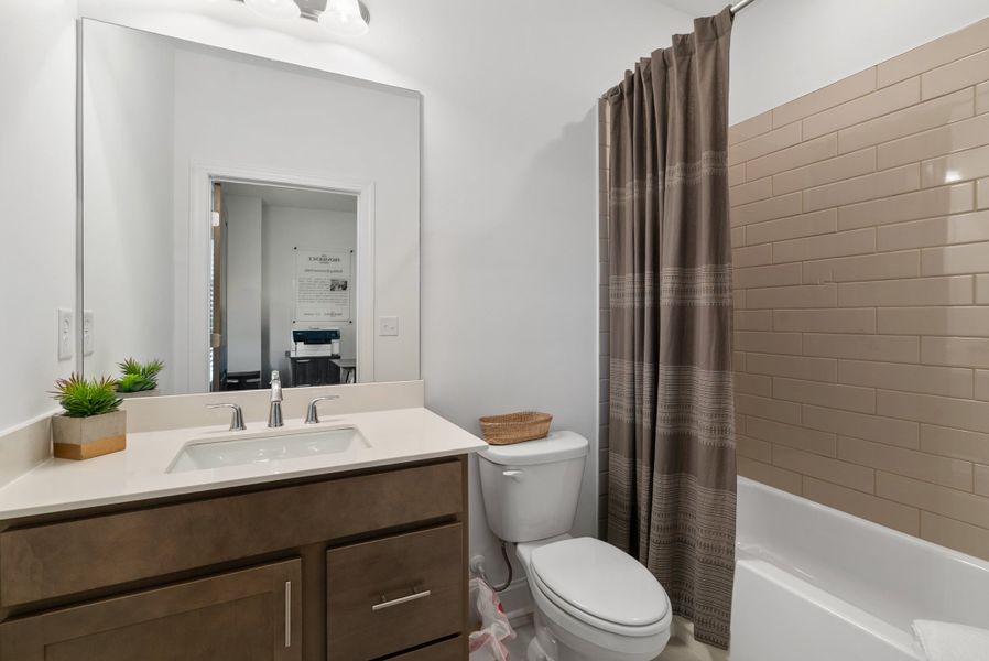 Representative furnished interior of a home built from the The Oleander by The Providence Group in Market Square at Sawnee Village, Cumming (Image 44).