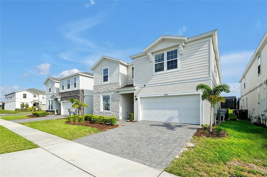 Exterior details and patio area of a home in Windsor Island Resort, Davenport (Image 29).