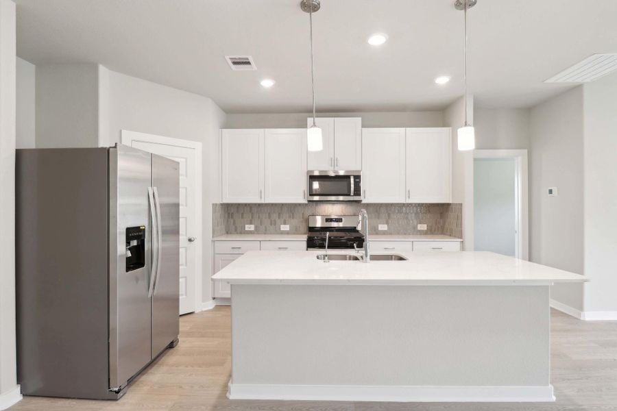 Furnished interior view inside a new home in Massey Oaks - Premier Series, Pearland (Image 5).