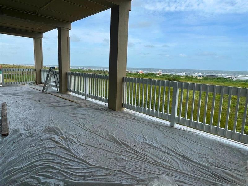 Step onto your own slice of paradise—this oversized beachfront deck is part of 2,100 sq ft of total outdoor living space, offering unobstructed Gulf views and cool ocean breezes. The upper level will include a private hot tub—perfect for relaxing after a long beach day or stargazing under the Texas sky. Step onto your own slice of paradise—this oversized beachfront deck is part of 2,100 sq ft of total outdoor living space, offering unobstructed Gulf views and cool ocean breezes. The upper level will include a private hot tub—perfect for relaxing after a long beach day or stargazing under the Texas sky.
