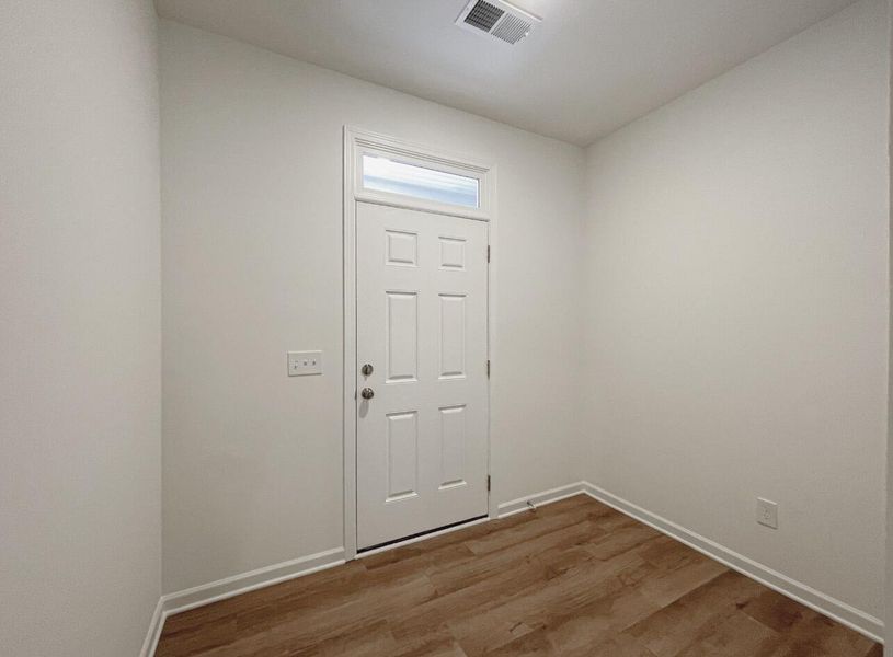 Spacious, unfurnished interior of a new home in East Main Townes, Spartanburg (Image 13).