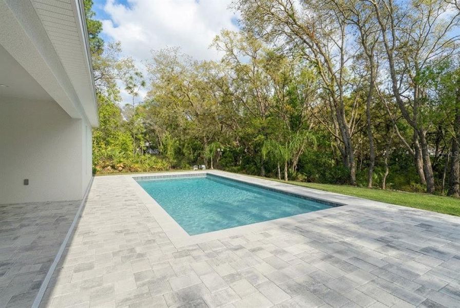 Exterior details and patio area of a home in , Weeki Wachee (Image 32).