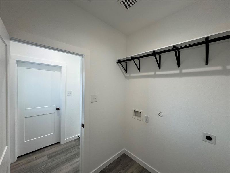 Primary room with a raised ceiling, ceiling fan, and carpet floors