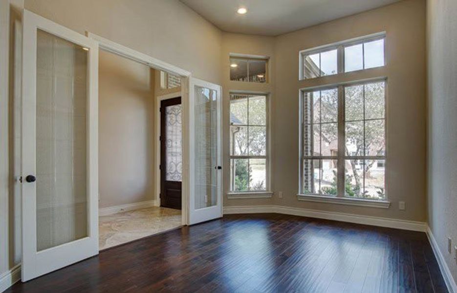 Representative unfurnished interior of a home built from the 3326 by Ravenna Homes in The Woodlands Hills 65′, Willis (Image 12).