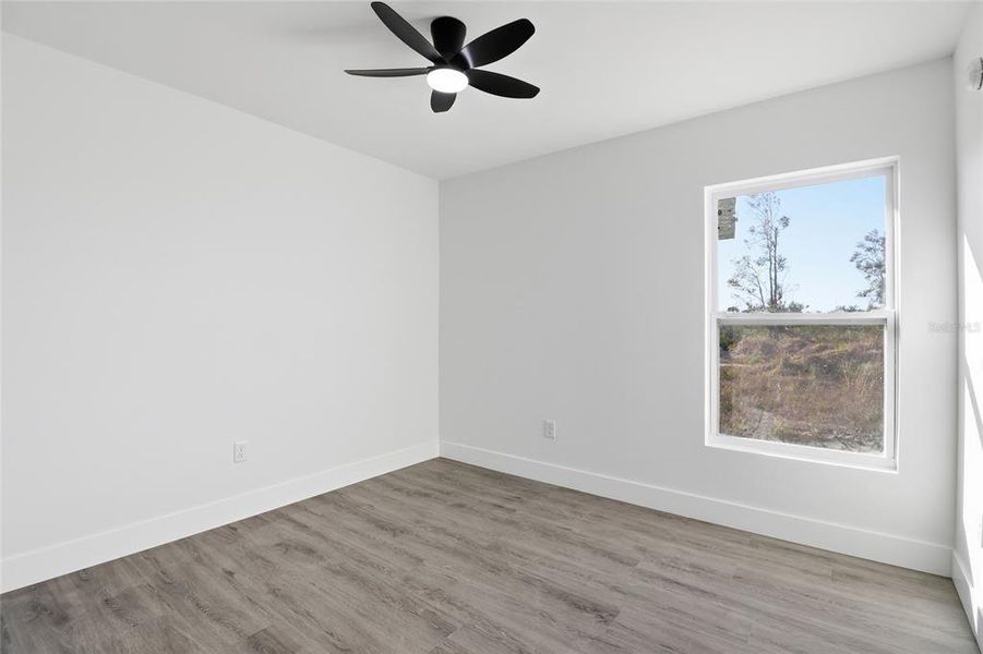 Spacious, unfurnished interior of a new home in , Port Charlotte (Image 15).