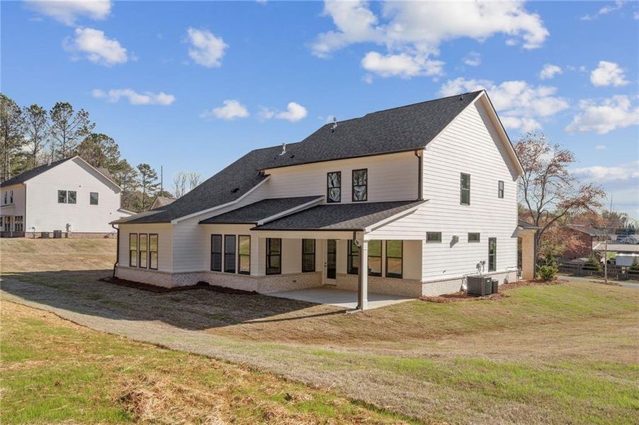 Exterior details and patio area of a home in The Reserve at Knollwood, Canton (Image 24).