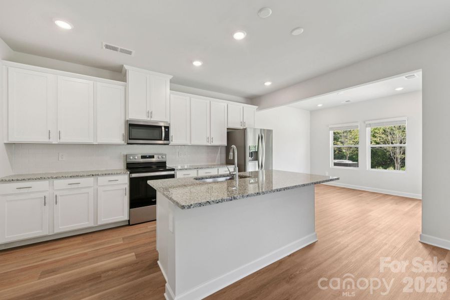 Photo is not of the actual home, but is an inspirational photo of builder’s model home and may depict options, furnishings, and/or decorator features that are not included Photo is not of the actual home, but is an inspirational photo of builder’s model home and may depict options, furnishings, and/or decorator features that are not included