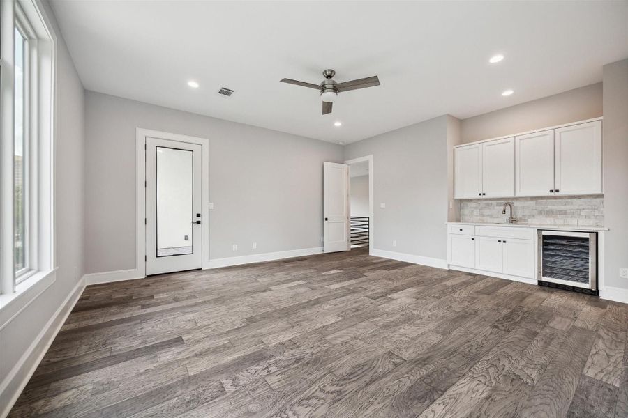 Flex Room/Guest Suite/Bedroom 5 with Kitchenette, en-suite bathroom and fitted walk-in closet as well as access to the upper covered front balcony Flex Room/Guest Suite/Bedroom 5 with Kitchenette, en-suite bathroom and fitted walk-in closet as well as access to the upper covered front balcony