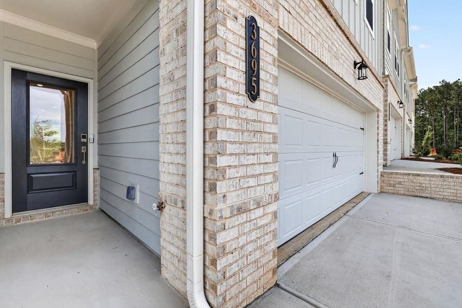 Exterior details and patio area of a home in Weatherfield, Buford (Image 25).