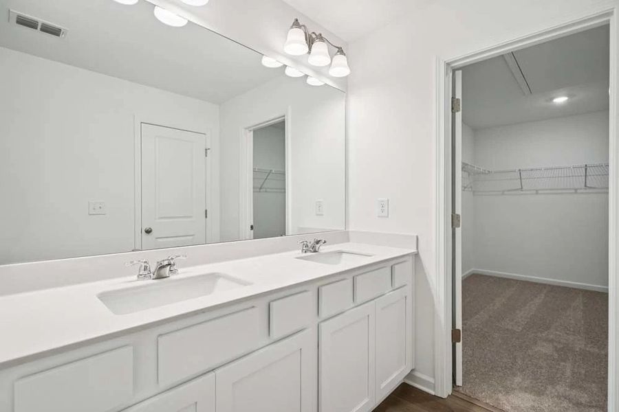 Representative Photo: Primary Bathroom featuring Timeless Collection Finishes