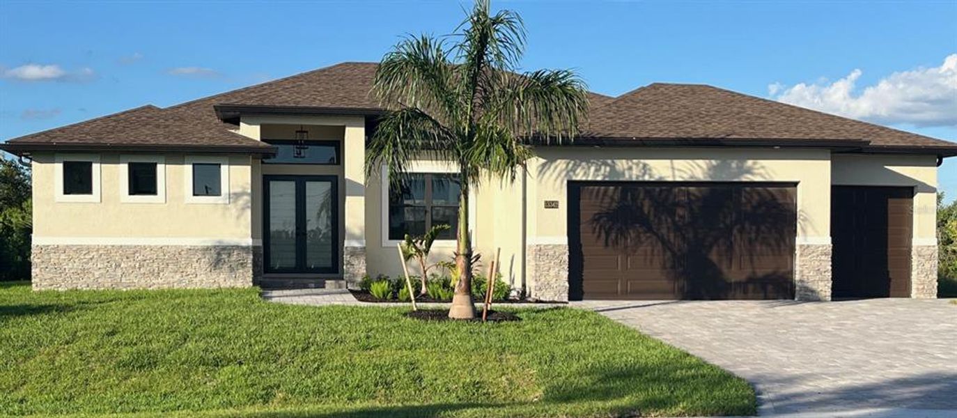 Front exterior of a new home in , Port Charlotte, FL, highlighting curb appeal (Image 1). Front exterior of a new home in , Port Charlotte, FL, highlighting curb appeal (Image 1).