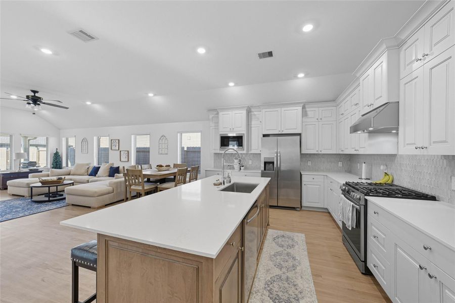 This photo showcases the spacious open-plan kitchen and breakfast area. This photo showcases the spacious open-plan kitchen and breakfast area.