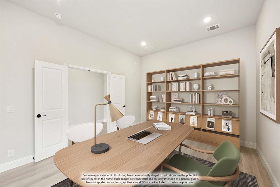 Home office with wood desk, built-in bookshelf, and light hardwood floors