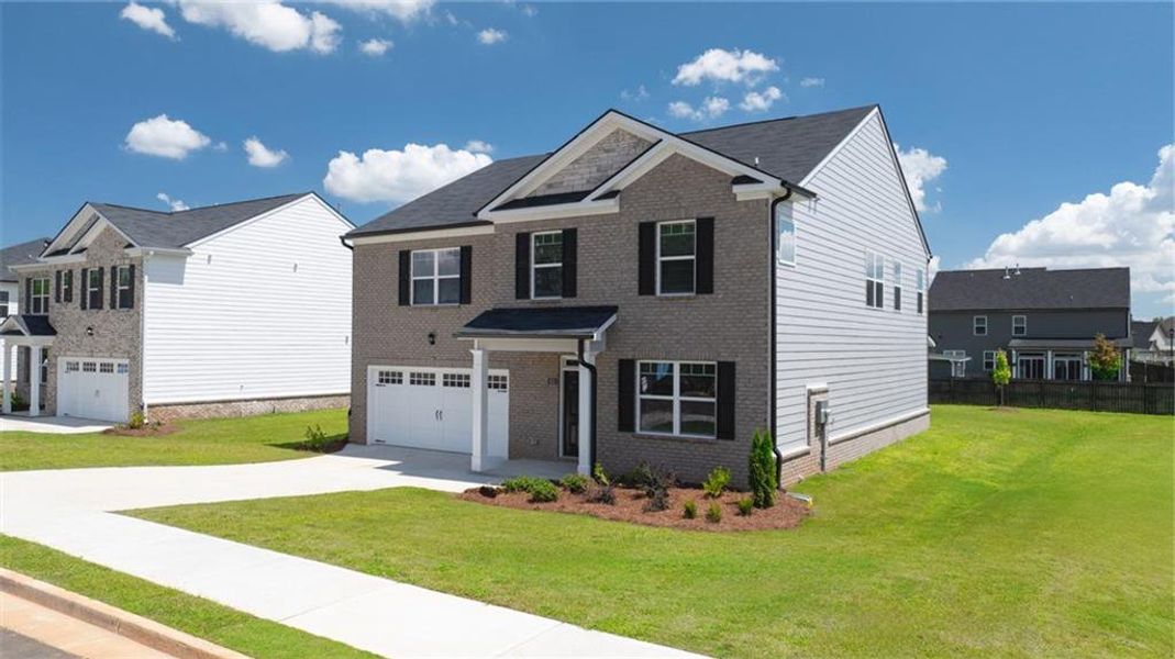 Front exterior of a new home in Bridle Creek, Locust Grove, GA, highlighting curb appeal (Image 24).