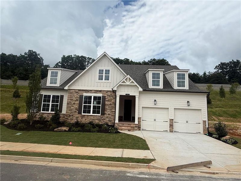Front exterior of a new home in , Canton, GA, highlighting curb appeal (Image 2).