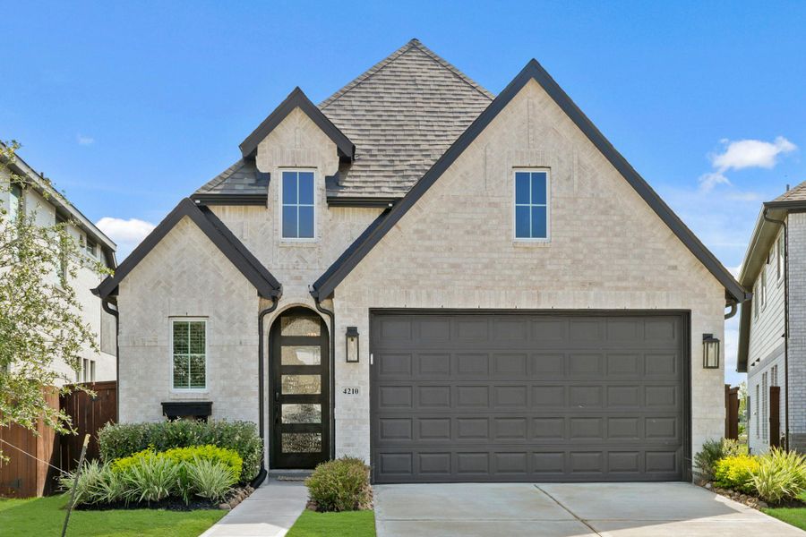 Front exterior of a new home in , Rosharon, TX, highlighting curb appeal (Image 22).