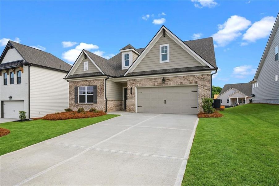 Front exterior of a new home in Summerlin, Winder, GA, highlighting curb appeal (Image 20).