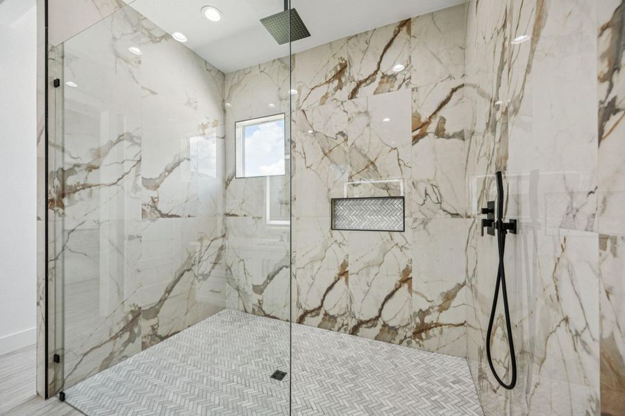 The primary shower is huge! It features a Rain shower head and a handheld as well. The primary shower is huge! It features a Rain shower head and a handheld as well.