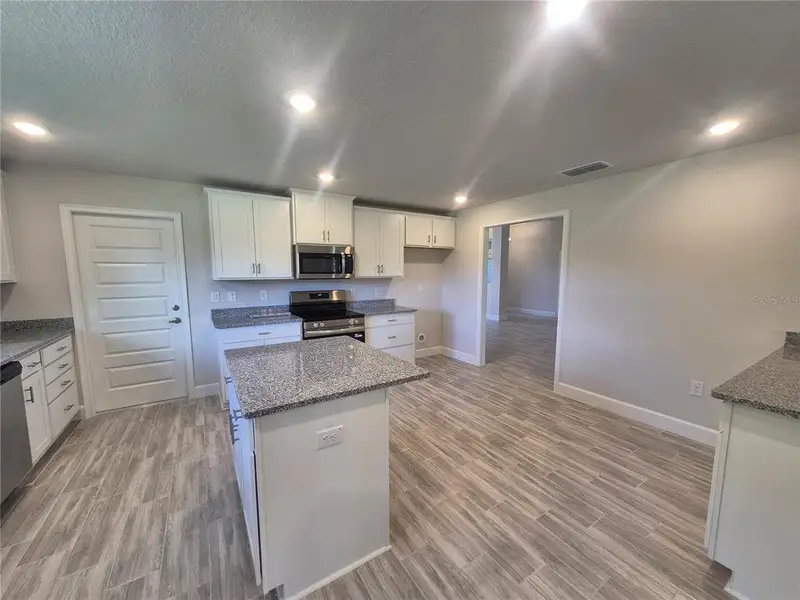 Furnished interior view inside a new home in Hill Country Estates, Dade City (Image 15). Furnished interior view inside a new home in Hill Country Estates, Dade City (Image 15).