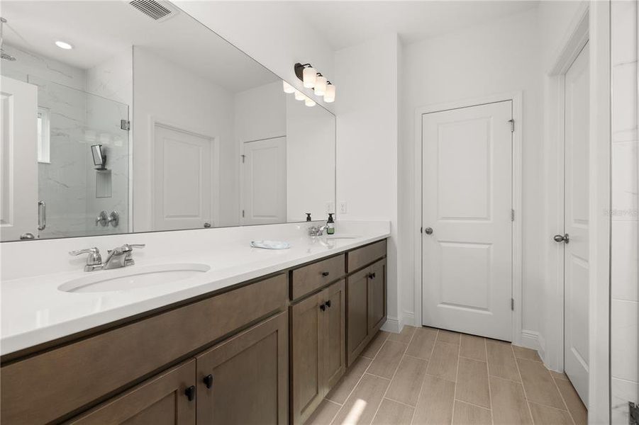 Furnished interior view inside a new home in Serenade at Ovation, Winter Garden (Image 17). Furnished interior view inside a new home in Serenade at Ovation, Winter Garden (Image 17).