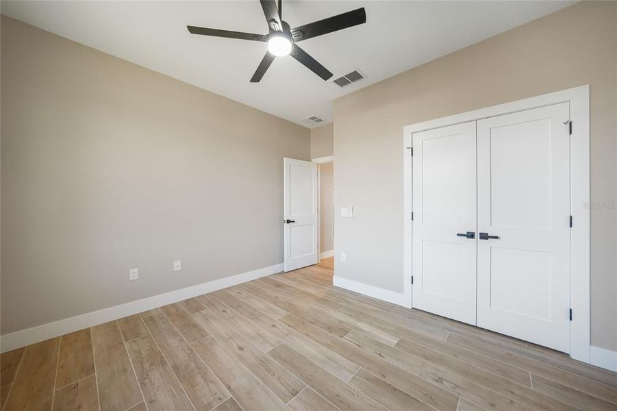 Spacious, unfurnished interior of a new home in , Port Charlotte (Image 36).