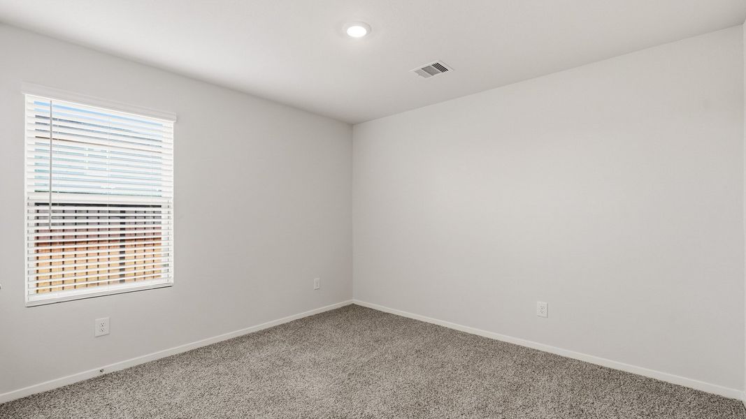 Spacious, unfurnished interior of a new home in Sunterra, Katy (Image 21).