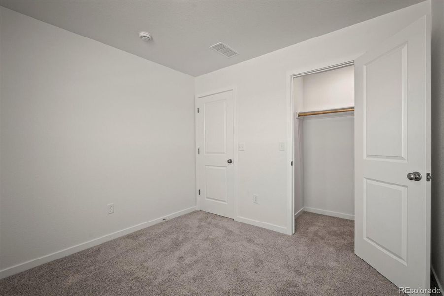 Spacious, unfurnished interior of a new home in Revel Crossing at Wolf Ranch – The Ascent Collection, Colorado Springs (Image 28).
