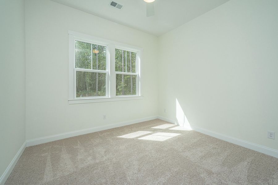 Spacious, unfurnished interior of a new home in , Awendaw (Image 42).