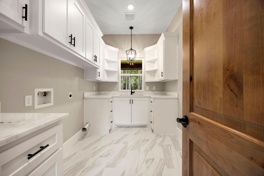 Furnished interior view inside a new home in , New Waverly (Image 33).