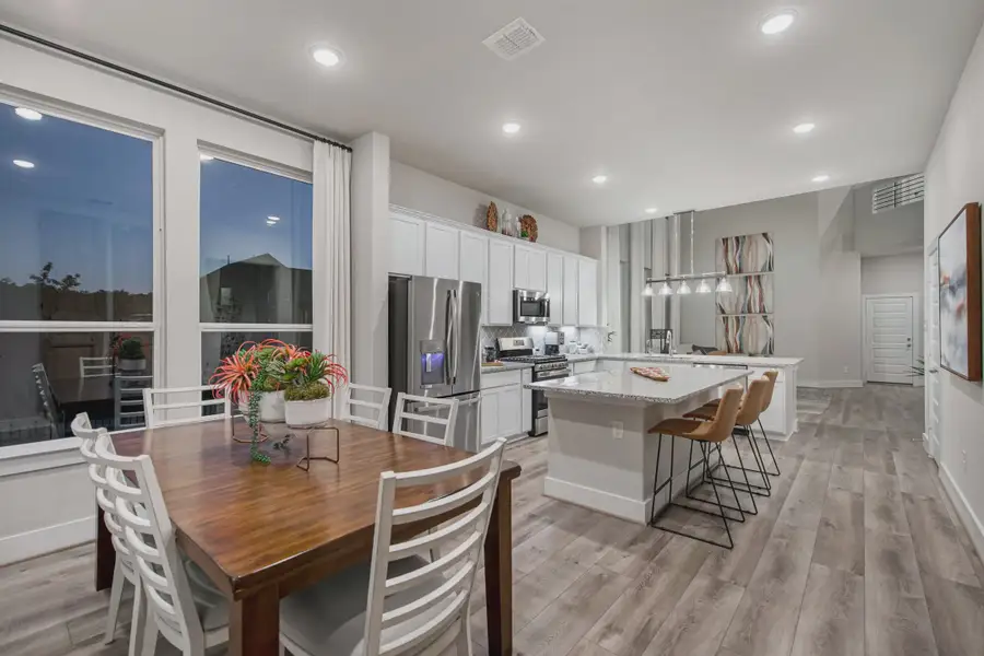 Representative furnished interior of a home built from the Powell by Chesmar Homes in Buffalo Crossing, Cibolo (Image 9).
