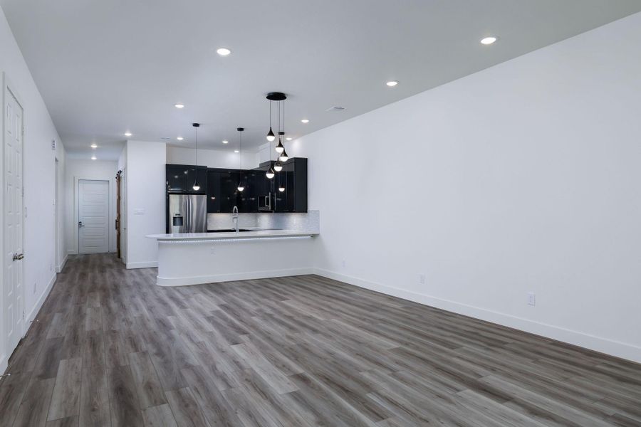 Open concept kitchen/living/dining