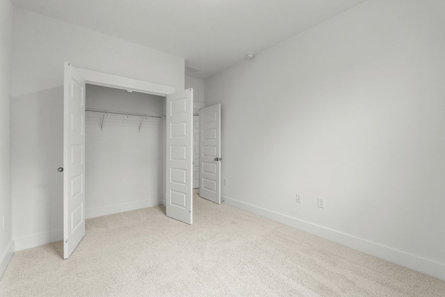Spacious, unfurnished interior of a new home in Long Bay Golf Club, Longs (Image 17).